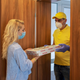 A man delivers pizza